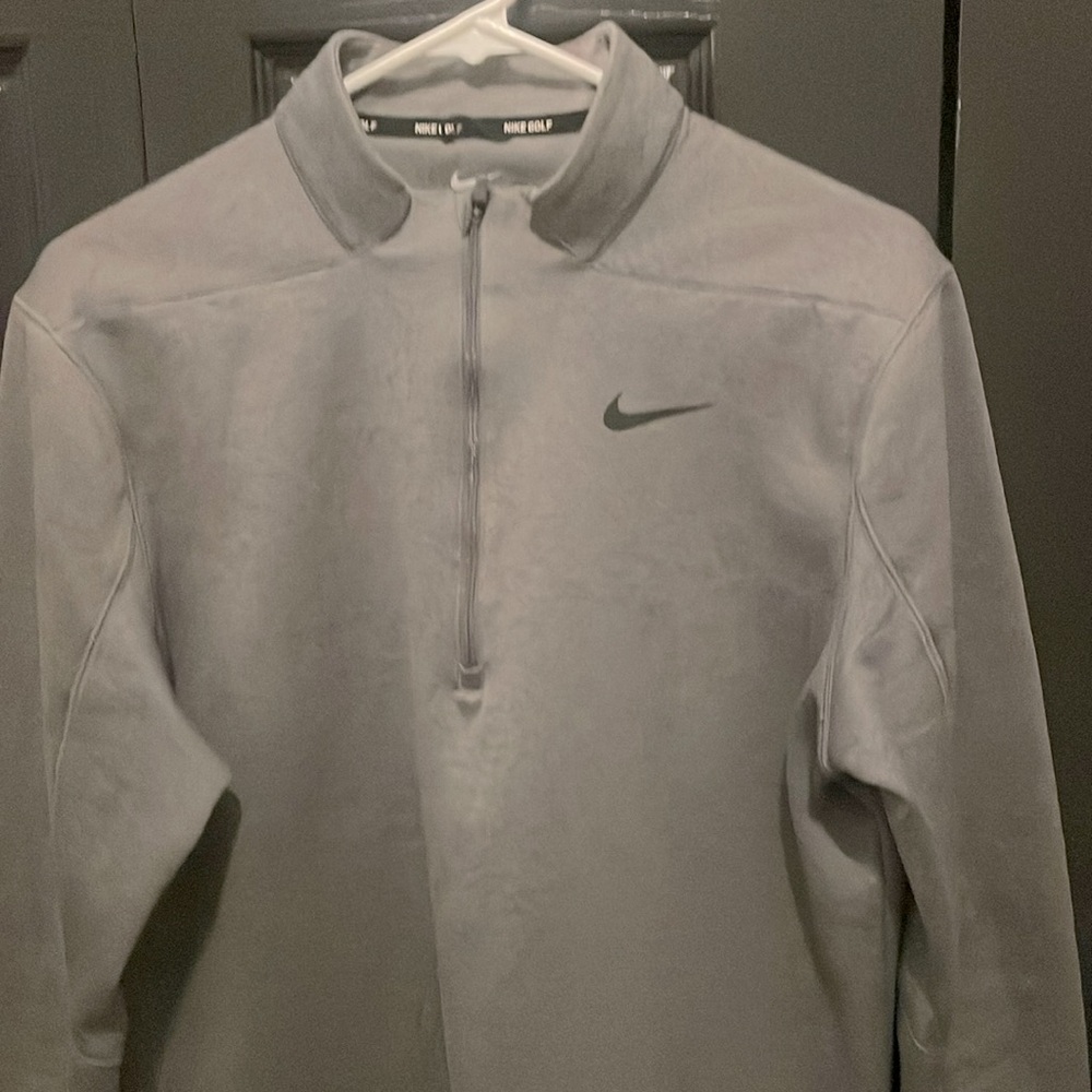 Nike golf pullover very warm and comfortable. Lightly worn in great condition